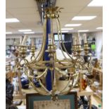 A gilt metal six light basket shaped ceiling chandelier