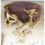 A French ormolu wall bracket, later mahogany top. 29x33cm