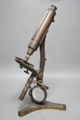 A Victorian brass microscope, 47cms high