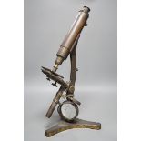 A Victorian brass microscope, 47cms high