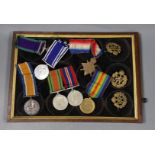 A WWI to Elizabeth II family medal group including WWI trio GSM with Borneo clasp, QEII Police medal
