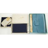 A Gucci blue leather address book, a Smythson leather travel wallet and a Christian Dior desk