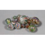 A group of latticino glass marbles