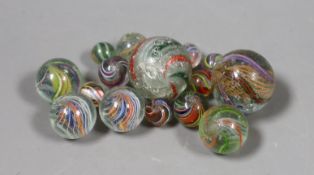 A group of latticino glass marbles