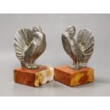 A pair of Art Deco silvered bronze 'turkey' bookends, 13cm high