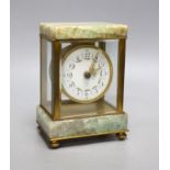 A French onyx and brass small mantel clock, with ornate enamel dial,14.5cms high