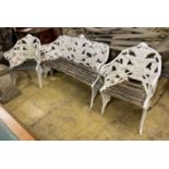A Victorian style fern pattern painted cast metal garden bench and two chairs, length 151cm, depth