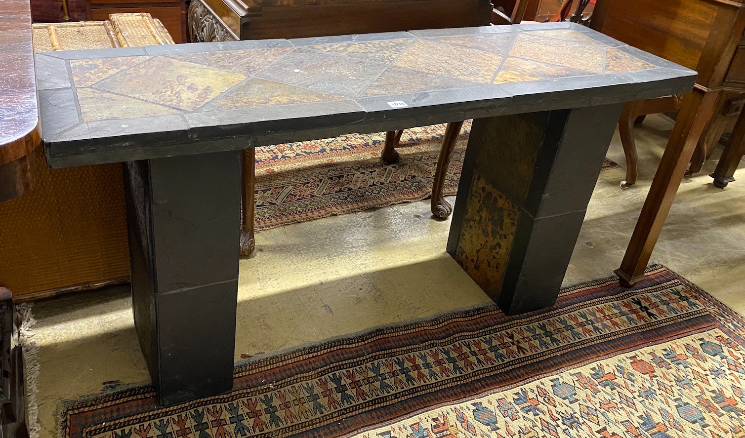 A South African rectangular slate console table, width 131cm, depth 40cm, height 65cm