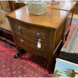 A pair of reproduction serpentine two drawer mahogany bedside chests, width 56cm, depth 41cm, height