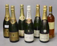 Two bottles of Etienne Dumont NV Champagne, two bottle of Louis Delauney NV Champagne, one bottle of