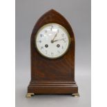 An Edwardian strung mahogany veneered lancet mantel clock, 28.5cm high