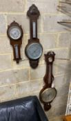An early 19th century mahogany wheel barometer, height 112cm together with two later oak aneroid