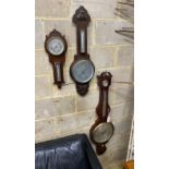 An early 19th century mahogany wheel barometer, height 112cm together with two later oak aneroid