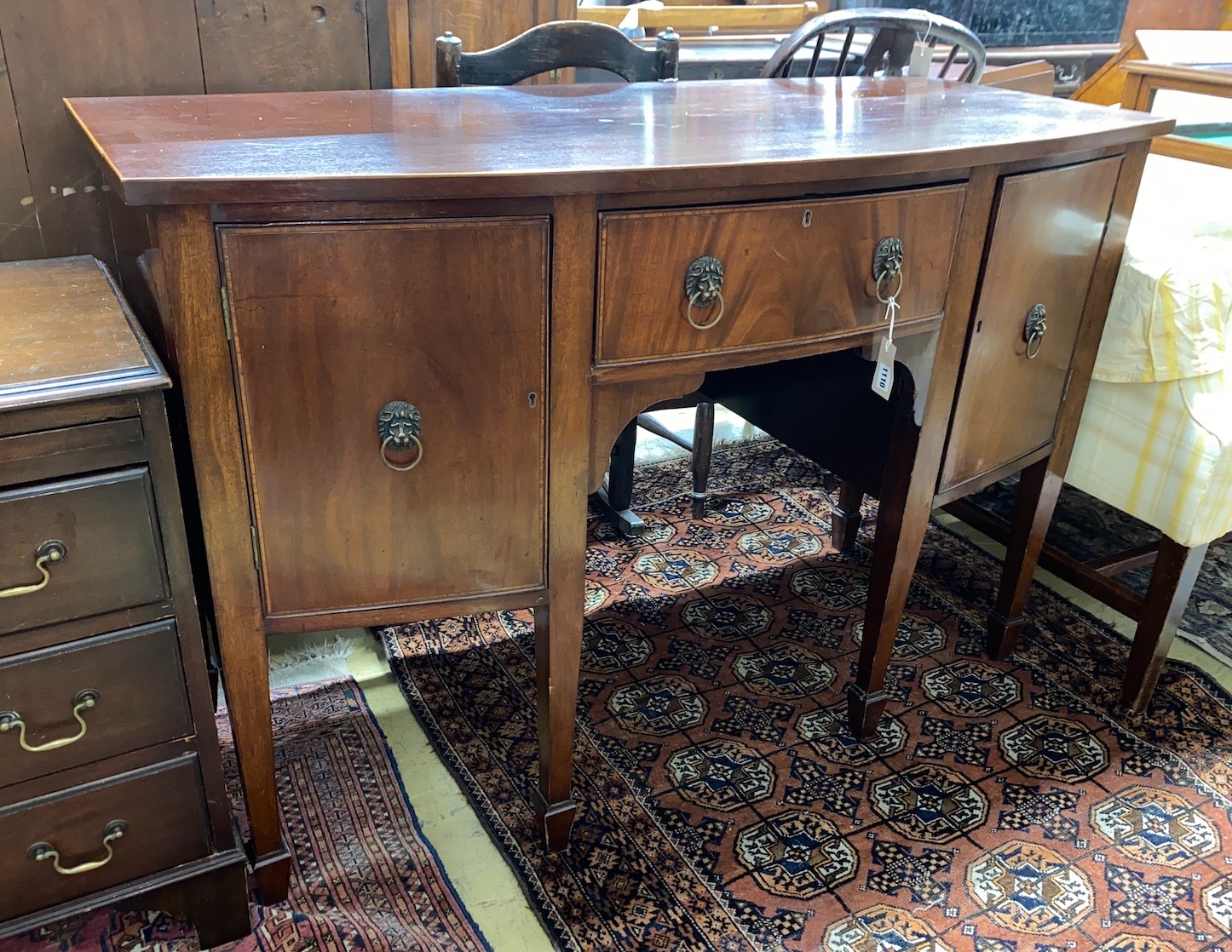 A George III style mahogany bowfront sideboard, length 138cm, depth 61cm, height 92cm