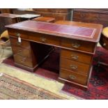 An early 20th century mahogany pedestal desk, width 136cm, depth 59cm, height 77cm