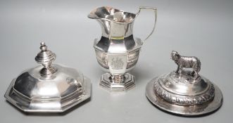 A 20th century silver cream jug by Mappin & Webb(date letter rubbed), height 13.9cm and two