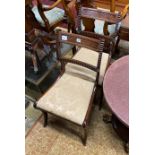 A pair of Regency brass mounted mahogany dining chairs