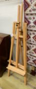 Two modern Windsor and Newton beech artists' studio easels, larger height 173cm