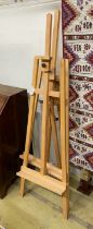 Two modern Windsor and Newton beech artists' studio easels, larger height 173cm