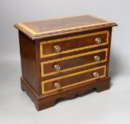 A miniature inlaid mahogany chest, 29cms wide x 25.5 cms high