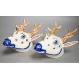 Two Continental pottery stag head wall pockets, 22cms high