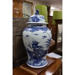 A large Chinese blue and white lidded baluster vase, 75cm tall