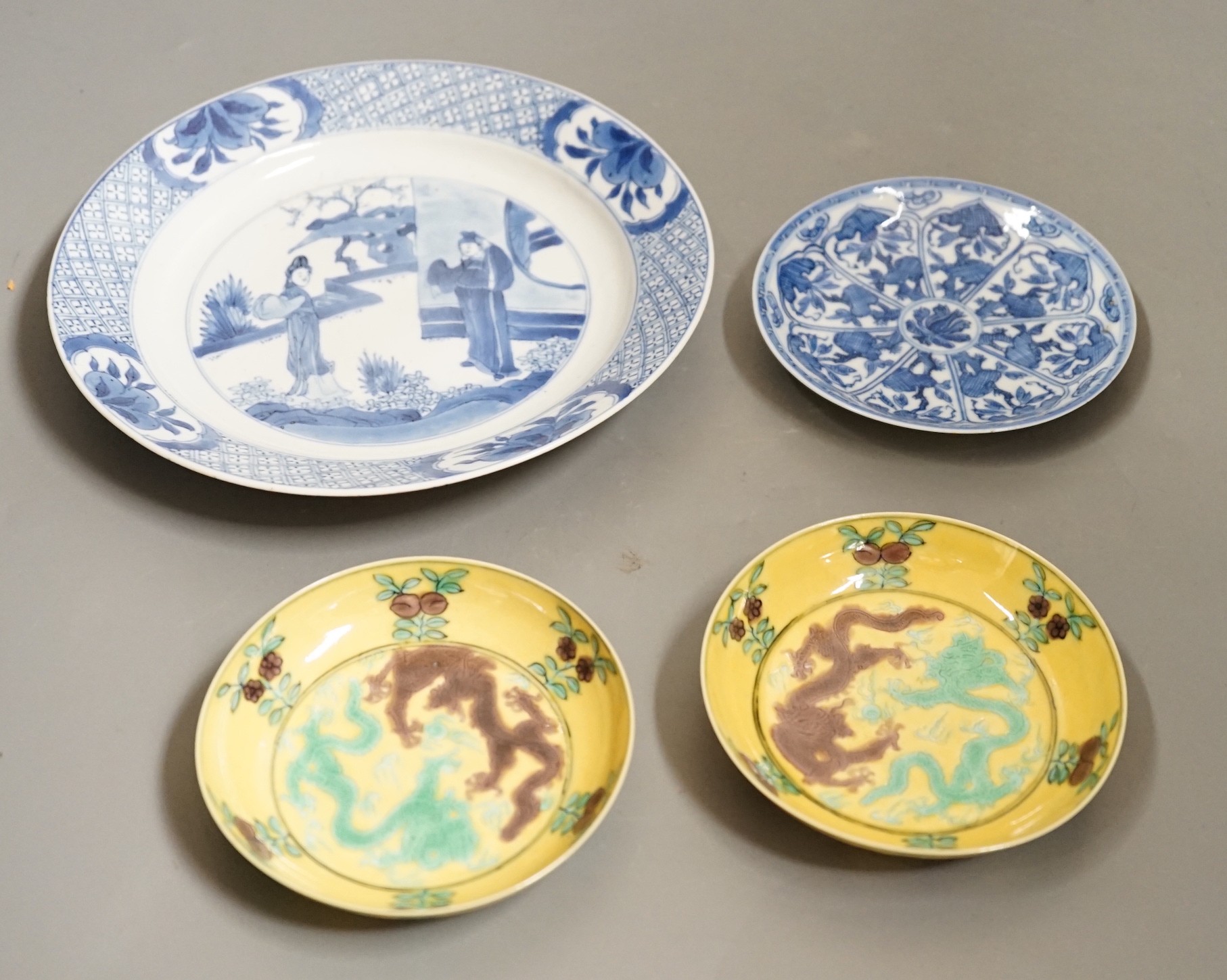 A pair of Chinese dragon dishes, a Kangxi blue and white plate, a Kangxi blue and white dish with