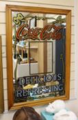 A beech framed Coca Cola advertising mirror, 96 x 65cm total