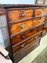 An early Victorian mahogany secretaire chest, fitted two short and four long drawers including a