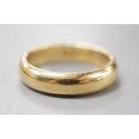 A 1970's 18ct gold wedding band, with engraved inscription, size O/P, 6.7 grams.