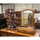 A Provincial turned beech spinning wheel and a Victorian mahogany toilet mirror, larger height 74cm