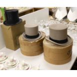 Three boxed top hats