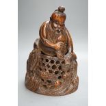 A Chinese bamboo figure of a fisherman, 19th century, 23cms high