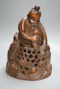 A Chinese bamboo figure of a fisherman, 19th century, 23cms high