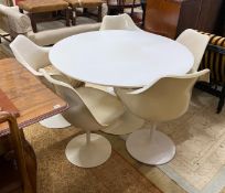 A "tulip" design dining table, diameter 120cm, height 72cm, and five chairs.