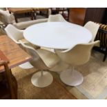 A "tulip" design dining table, diameter 120cm, height 72cm, and five chairs.
