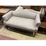 A pair of Victorian style upholstered settees with hump backs, scroll arms on square tapered legs,