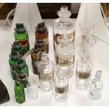 A collection of apothecary bottles, two measures and files, tallest bottle 27cms high,