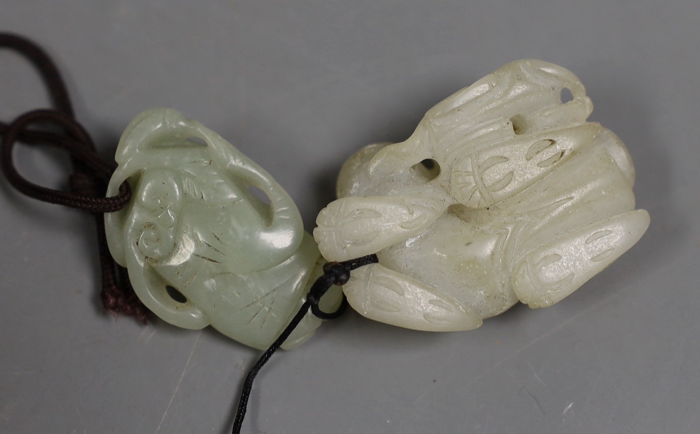 A Chinese pale celadon jade lion dog and cub and a similar figure of a boy, 19th/20th century - Image 3 of 3