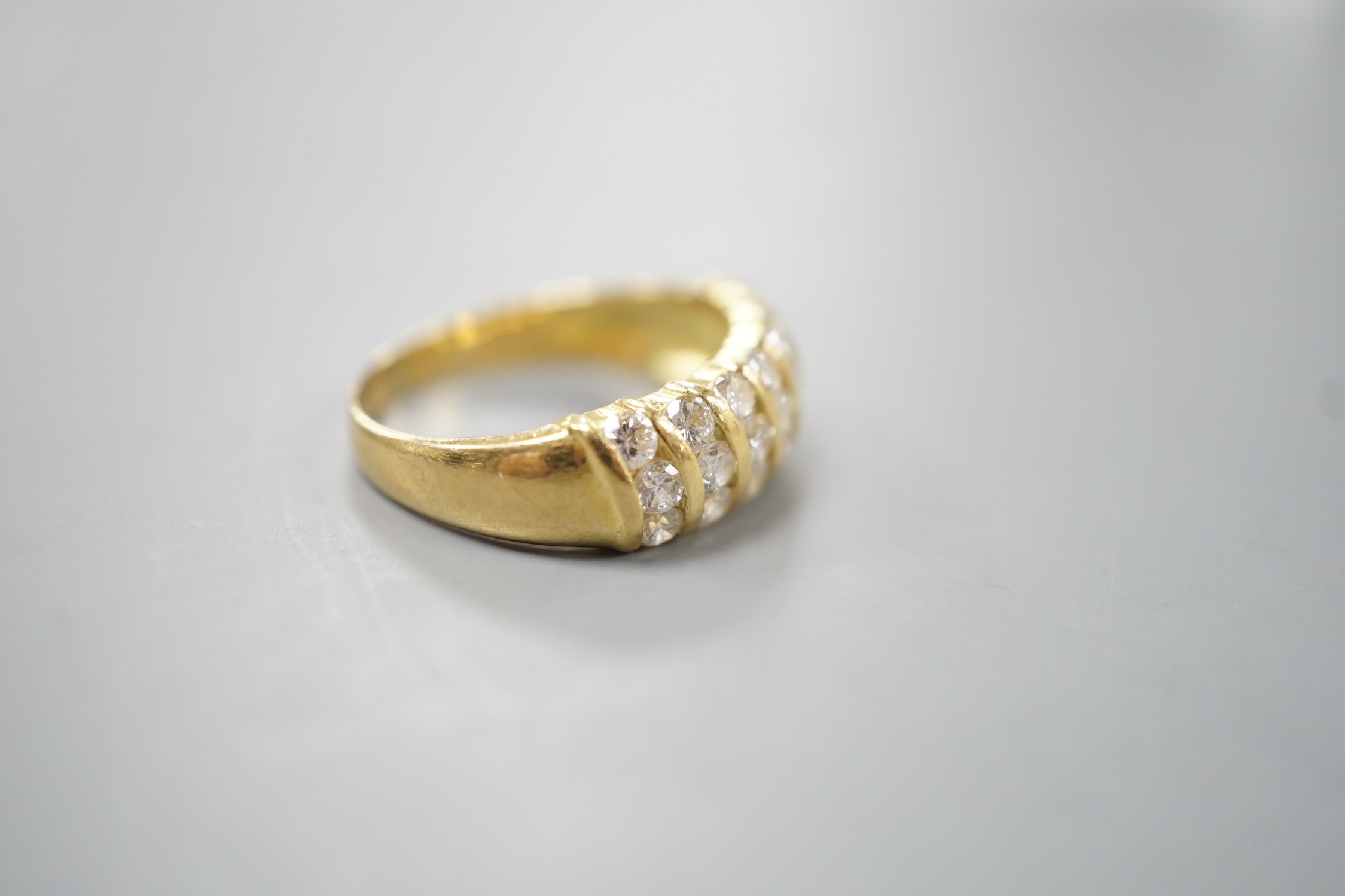 A modern 18ct gold and twenty one stone diamond set seven row half hoop ring, size N, gross weight - Image 3 of 5