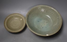 A Chinese celadon dish, probably Southern Song Dynasty, 17.5cm and a Thai Sawankhalok celadon deep