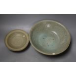 A Chinese celadon dish, probably Southern Song Dynasty, 17.5cm and a Thai Sawankhalok celadon deep