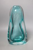 A large green glass free-form sculpture, possibly Murano, 30cms high
