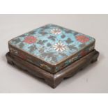 A Chinese Ming cloisonné enamel lozenge shaped stand, 15cms wide