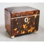 A rare small 19th century tortoiseshell and ivory mounted tea caddy, 9cms wide x 10cms high Ivory
