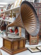 An early 20th century table top Gramophone, with large metal horn, 80cms high