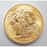 An Elizabeth II 1966 gold sovereign.