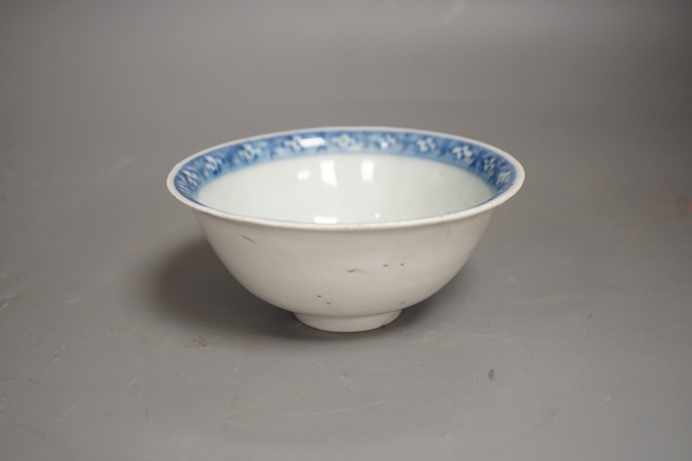 A Chinese late Ming blue and white lion-dog bowl, the base with ‘Made in the Great Ming dynasty’ - Image 7 of 10