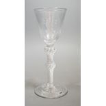 A mid 18th century double knop airtwist wine glass, 16cms high