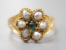 A late Victorian gold, emerald and split pearl cluster set ring, with later engraved inscription,